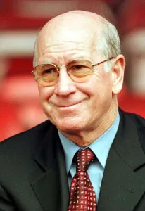 Manchester United Director Bobby Charlton smiles as he enjoys watching a training session Manchester United Director Bobby Charlton smiles as he enjoys watching a training session
