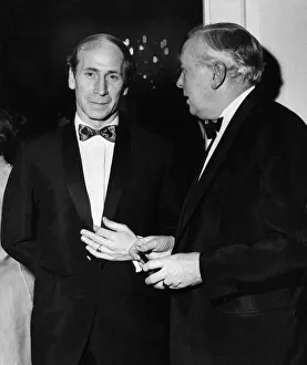 Manchester United footballer Bobby Charlton talking to Prime Minister Harold Wilson at a Manchester United footballer Bobby Charlton talking to Prime Minister Harold Wilson at a