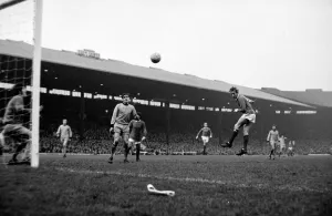 Manchester United forward Denis Law heads the ball towards goal during the league match Manchester United forward Denis Law heads the ball towards goal during the league match