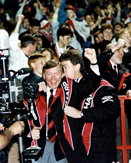 Manchester United manager Alex Ferguson celebrates with assistant Brian Kidd as his team Manchester United manager Alex Ferguson celebrates with assistant Brian Kidd as his team