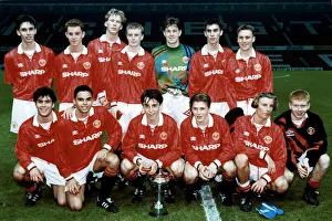 Manchester United youth team pose with the Lancashire Youth Cup following their victory Manchester United youth team pose with the Lancashire Youth Cup following their victory