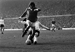 Manchester United's George Best is challenge by Stoke defender March 1972 Manchester United's George Best is challenge by Stoke defender March 1972