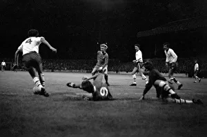 Mansfield v. Liverpool. Mansfield's Quigley (No. 4) races away from Graham after Mansfield v. Liverpool. Mansfield's Quigley (No. 4) races away from Graham after