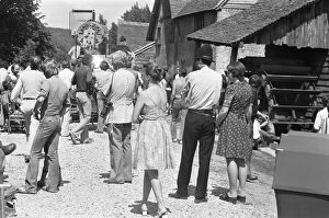 Images Dated 14th June 1976: Mapledurham villagers watch on, as the next scene is filmed for The Eagle Has Landed