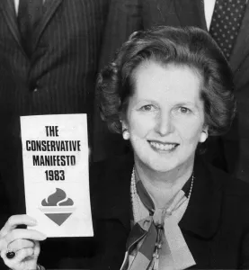 Margaret Thatcher holding 1983 Conservative party manifesto - May 1983 Margaret Thatcher holding 1983 Conservative party manifesto - May 1983