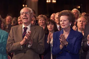 Margaret Thatcher and husband Denis Thatcher applauding a speech by Lord Archer at Margaret Thatcher and husband Denis Thatcher applauding a speech by Lord Archer at