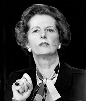 Margaret Thatcher looking serious and forbidding during press conference/speech - June Margaret Thatcher looking serious and forbidding during press conference/speech - June