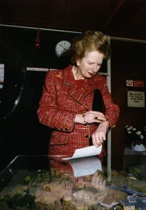 Margaret Thatcher looking at a model of the promised £ Margaret Thatcher looking at a model of the promised £