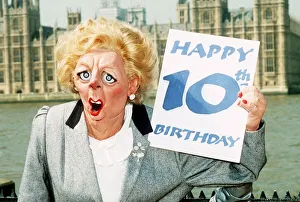 Margaret Thatcher MP Puppet holding up 10th Happy Birthday card. 1989 Margaret Thatcher MP Puppet holding up 10th Happy Birthday card. 1989
