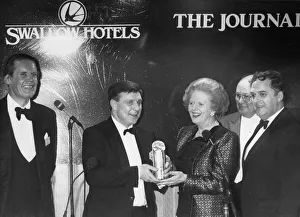 Margaret Thatcher presents the award to Mr Bernard Robinson, with Paul Nicholson, left Margaret Thatcher presents the award to Mr Bernard Robinson, with Paul Nicholson, left
