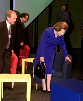Margaret Thatcher the former Prime Minister of Britain examines one of the armchairs Margaret Thatcher the former Prime Minister of Britain examines one of the armchairs
