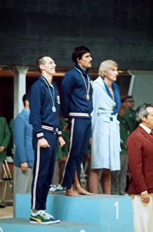 Mark Spitz swimmer 1972 Munich Olympics on rostrum receiving gold medal track suit Mark Spitz swimmer 1972 Munich Olympics on rostrum receiving gold medal track suit