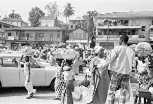 Market traders on Water Street Monrovia, Liberia buying and selling food March 1980 Market traders on Water Street Monrovia, Liberia buying and selling food March 1980