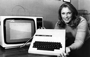 Marketing assistant Wendy Barker with the computer that has filled Dragon' Marketing assistant Wendy Barker with the computer that has filled Dragon'