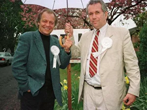 Martin Bell shares umbrella with actor David Sole during his election campaign April Martin Bell shares umbrella with actor David Sole during his election campaign April