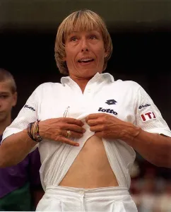 Martina Navratilova has the crowd in stitches as she apes Andre Agassi Martina Navratilova has the crowd in stitches as she apes Andre Agassi