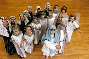 Mary and Joseph, Hannah Thompson (4) and Jamie Rozario (5) with the Angel Sarah Beaver (4 Mary and Joseph, Hannah Thompson (4) and Jamie Rozario (5) with the Angel Sarah Beaver (4