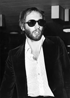 Maurice Gibb of the Bee Gees pop group leaves for Ibiza. Heathrow Airport. April 1973 Maurice Gibb of the Bee Gees pop group leaves for Ibiza. Heathrow Airport. April 1973