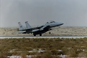 A McDonnell Douglas F15 Eagle of the USAF lands on a desert runway during the Gulf War A McDonnell Douglas F15 Eagle of the USAF lands on a desert runway during the Gulf War