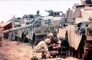 Members of the 7th Armoured Brigade prepare their challenger tanks before the start of Members of the 7th Armoured Brigade prepare their challenger tanks before the start of
