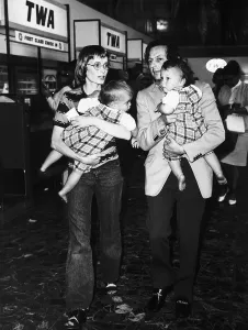Mia Farrow Actress with husband and twin sons at Heathrow airport Dbase MSI Mia Farrow Actress with husband and twin sons at Heathrow airport Dbase MSI