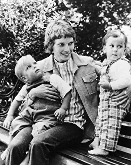 Mia Farrow Actress with her two sons Sascha Villiers and Matthew Phineas sitting on park Mia Farrow Actress with her two sons Sascha Villiers and Matthew Phineas sitting on park