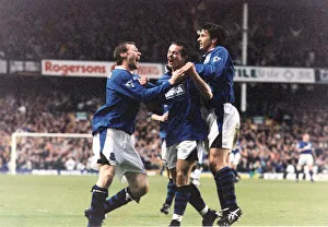 Michael Branch of Everton celebrates a goal against Leicester congratulated by teammates Michael Branch of Everton celebrates a goal against Leicester congratulated by teammates