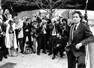 Michael Douglas actor leans on wall being photographed Michael Douglas actor leans on wall being photographed