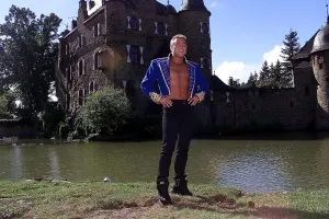 MICHAEL FLATLEY OUTSIDE THE SATZVEY CASTLE IN GERMANY. WERE HE LAUNCHED HIS NEW WORLD MICHAEL FLATLEY OUTSIDE THE SATZVEY CASTLE IN GERMANY. WERE HE LAUNCHED HIS NEW WORLD