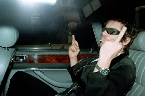 Michael Hutchence leaving Paula Yates flat giving the photographers the finger dbase msi Michael Hutchence leaving Paula Yates flat giving the photographers the finger dbase msi