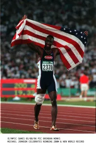 Michael Johnson American athlete celebrates winning the 200m final Michael Johnson American athlete celebrates winning the 200m final