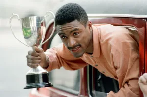 Michael Watson with the British Commonwealth middleweight trophy after defeating Nigel Michael Watson with the British Commonwealth middleweight trophy after defeating Nigel