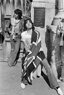 Mick Jagger (with Union Jack flag) and his Rolling Stones band stand at the famous Alamo Mick Jagger (with Union Jack flag) and his Rolling Stones band stand at the famous Alamo