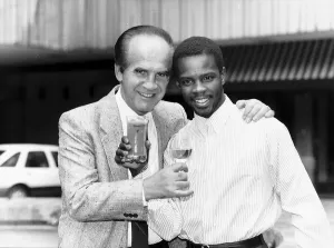 Mickey Duff Boxing Manager and Promoter drinks a toast with one of his Boxers Duke Mickey Duff Boxing Manager and Promoter drinks a toast with one of his Boxers Duke