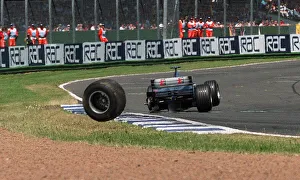 Mika Hakkinen British Grand Prix Silverstone July 1999 loses a wheel off his car Mika Hakkinen British Grand Prix Silverstone July 1999 loses a wheel off his car