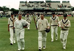 Mike Atherton and Alec Stewart leave the field July 1998 after putting on over two Mike Atherton and Alec Stewart leave the field July 1998 after putting on over two