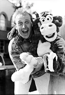 Mike Brosnan TV presenter with Chuck the Chimpanzee Mike Brosnan TV presenter with Chuck the Chimpanzee