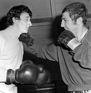 Mike Summerbee gets a right hander from heavyweight boxer Kevin Madden in the Gym where Mike Summerbee gets a right hander from heavyweight boxer Kevin Madden in the Gym where