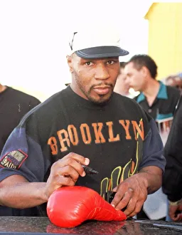 Mike Tyson signs autographs for fans after training Mike Tyson signs autographs for fans after training