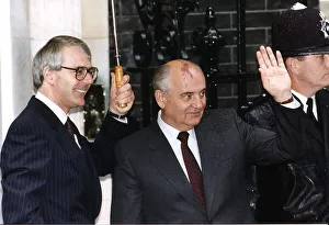 Mikhail Gorbachev stands with John Major under umbrella outside 10 Downing Street 1991 Mikhail Gorbachev stands with John Major under umbrella outside 10 Downing Street 1991