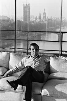 Images Dated 15th September 1982: Millionaire author Jeffrey Archer pictured in his penthouse Embankment flat overlooking