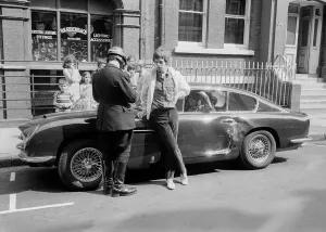 0000to0099 Prints: Rolling Stones Print: Mick Jagger's Midnight Blue Aston Martin DB6 Crash
