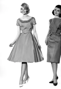60s Fashion Trends Prints: Woman wearing flared dress November 1962 P008868