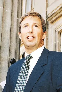 Bill McFarlan Print (Blue Suit, Green and Blue Spotted Tie)