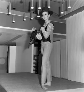 60s Fashion Trends Prints: Mary Quant fashion clothing Model wearing trousers and a waistcoat and hat