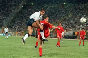 Prints of World Cup 1990 Last 16 England 1 Belgiun 0 after extra time Steve Bull (white) heads the ball away from Franky Van Der Elst Mirror Prints: World Cup 1990 Last 16 England 1 Belgium 0 Print