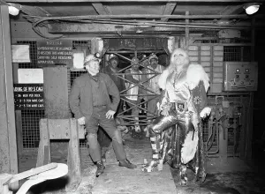 Prints of Adrian Street, Welsh professional wrestler, pictured with his father, a coal miner, 2nd November 1974. A.k.a. Kid Tarzan Jonathan, The Nature Boy, Hells Angel #1 Mirror Prints: Adrian Street with Father, Coal Miner Print 1974