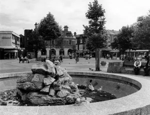 Prints of Victorian and modern mingle in the centre of Hyde, Greater Manchester. The pleasant new square by the main shopping market. Circa 1975 1300to1399 Prints: Victorian and Modern Mingle in Hyde, circa 1975 Print