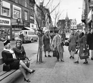 Prints of Taking a rest during their eep Leicester Tidywalkabout, the Lord Mayor, Mrs Irene Pollard, and the Lady Mayoress her daughter, Mrs Susan Cufflin Leicestershire Prints: Black and white print of the Lord Mayor resting in Gallowtree Gate