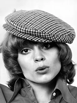 Model Amanda tries a cloth cap. May 1973 P007870 Model Amanda tries a cloth cap. May 1973 P007870